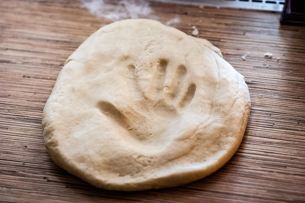 childs-handprint-in-dough