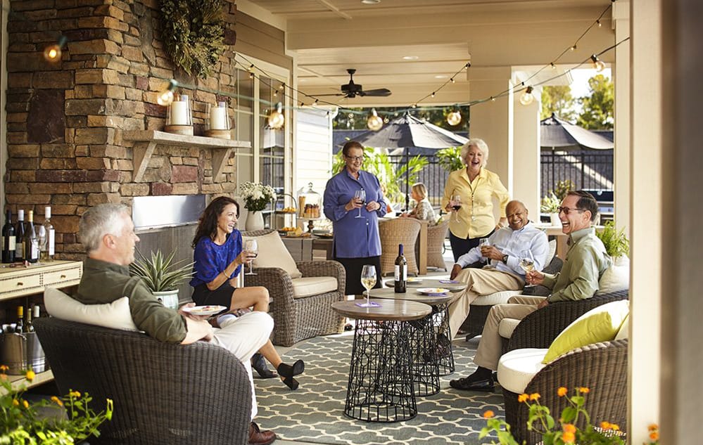 adults-socializing-on-outdoor-patio