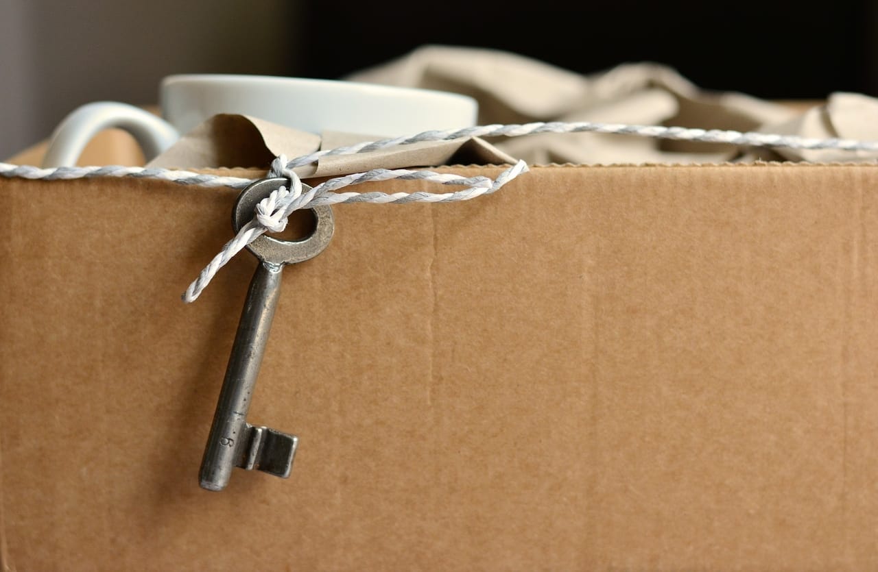 packed-cardboard-box-with-key